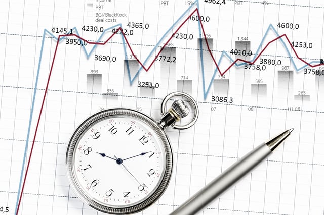 Pocket watch and business concepts on digital background.jpeg