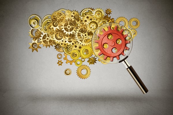 Security idea generation focus concept. Magnifying glass verifying a group of server gears representing internet protection from cyber crimes or teamwork leader concept-1